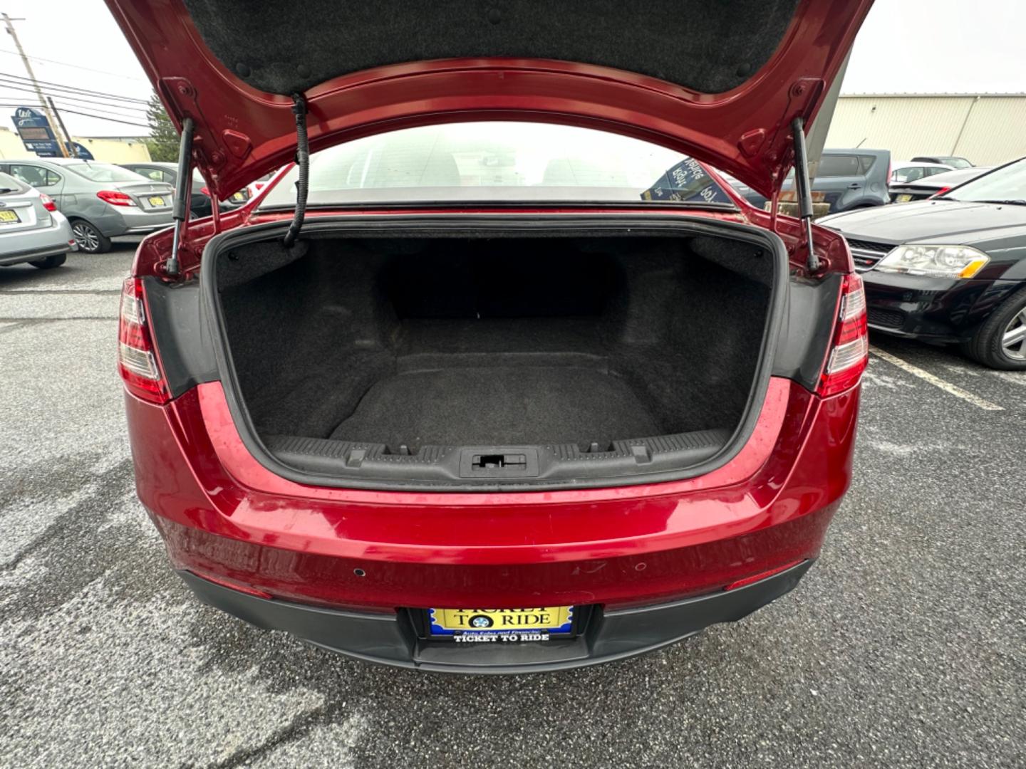 2013 RED Ford Taurus SEL FWD (1FAHP2E8XDG) with an 3.5L V6 DOHC 24V engine, 6-Speed Automatic transmission, located at 1254 Manheim Pike, Lancaster, PA, 17601, (717) 393-9133, 40.062870, -76.323273 - Photo#10